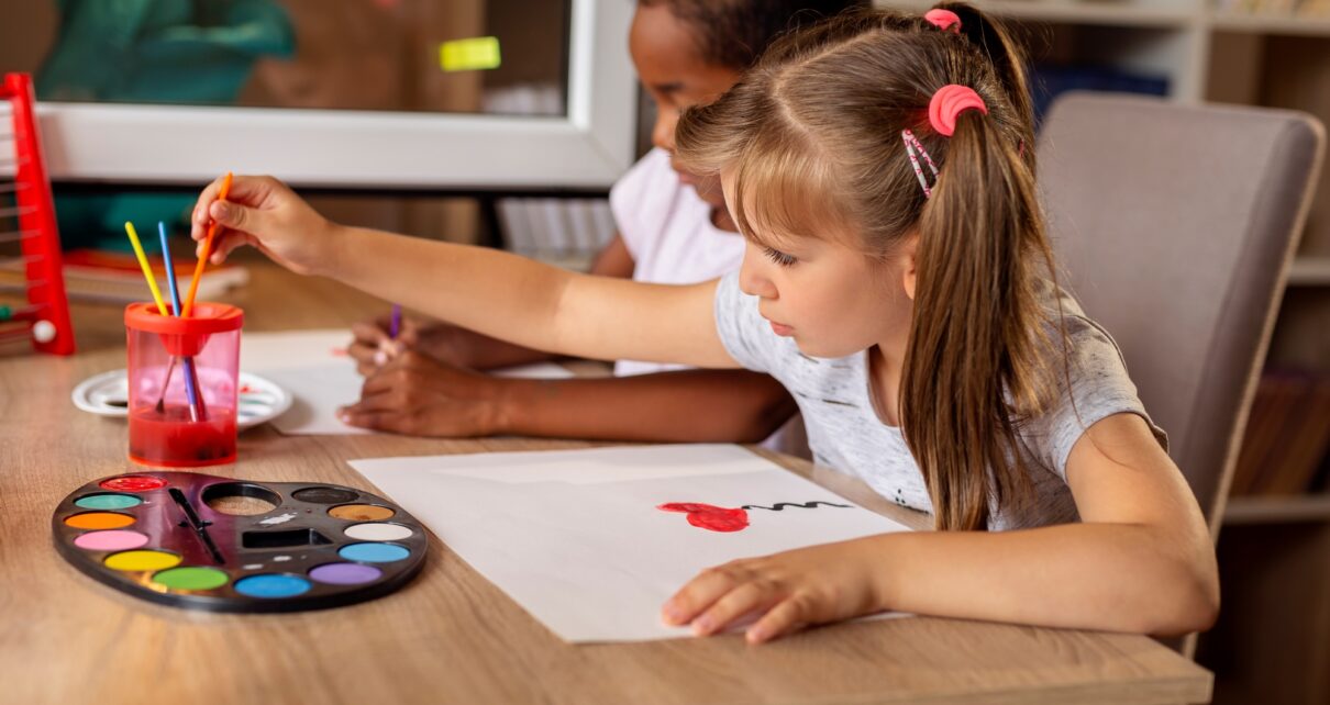 Children doing art class at home