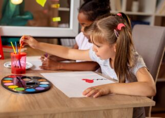 Children doing art class at home