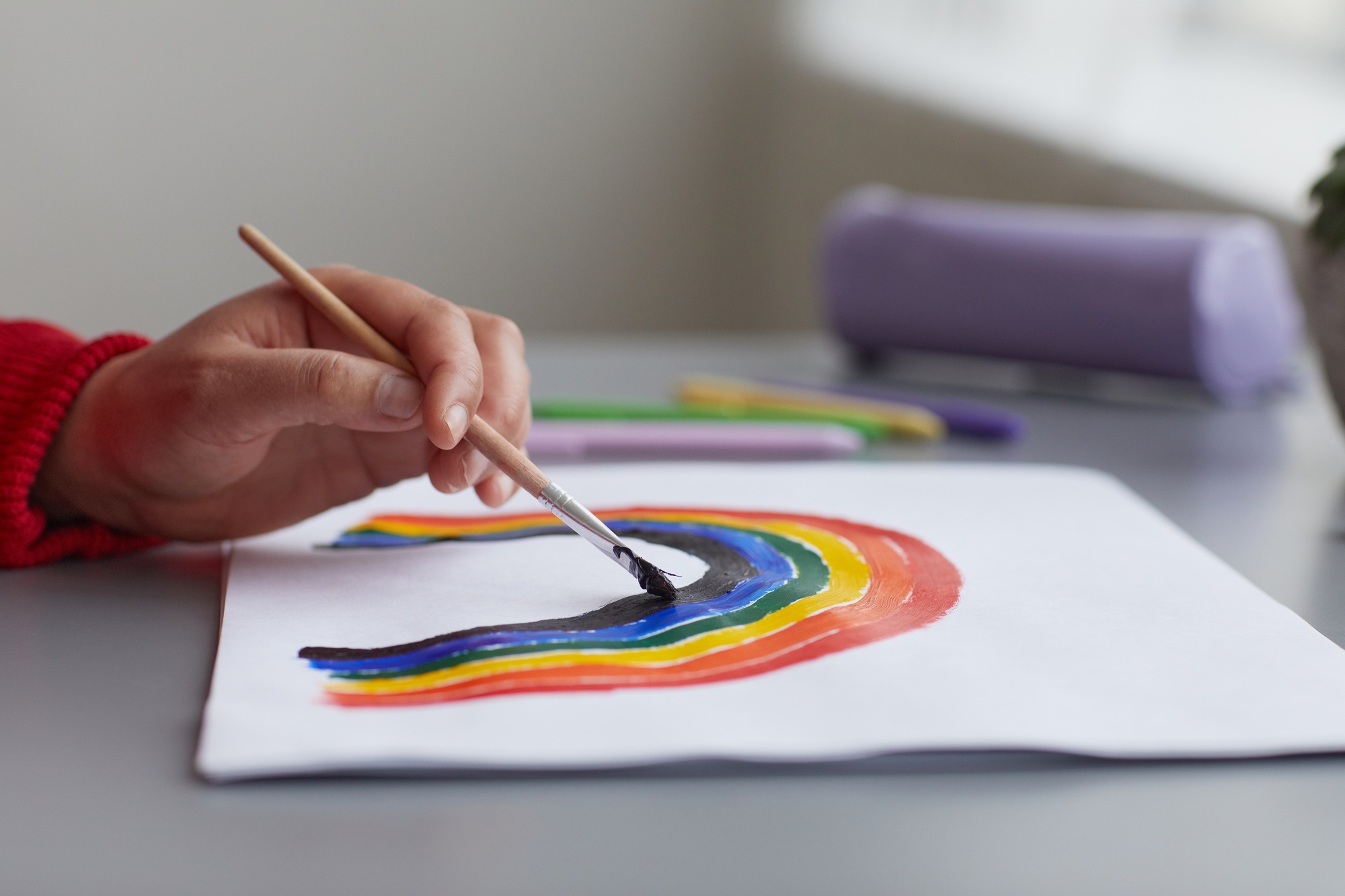Woman Drawing Rainbow Close Up